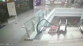 Man rescues baby in stroller falling down escalator in China’s Jiangsu
