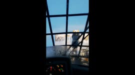 Plowing snow in comfort in a 966m cat loader in snow storm