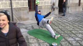 Street performing goalkeeper wows audience by defying gravity