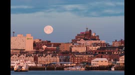 Time lapse shows moon setting over Portland, Maine