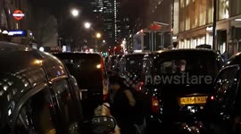 London black cab drivers block streets protesting at Tottenham Court Road