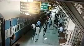Heart-stopping moment cop saves man falling from moving train