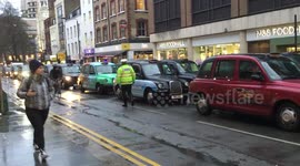 London cabbies block Tottenham Court Road over vehicle ban