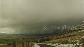 Time-Lapse of Massive Snow Squall Engulfing Mountain