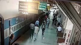 A policeman saves a 55 year old man who fell while trying to board a moving train