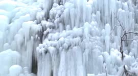 Spectacular drone video of frozen waterfalls forming on China’s Tianmen Mountain