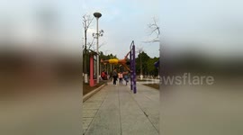 Worker shows off impressive moonwalk on gymnastic wall bars