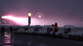 Niagara falls frozen as ice and mist blows in severe cold weather in Canada making for epic spectacular views at night