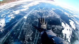 Ice magician? Man plays fun tricks with ice on Lake Baikal