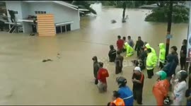 Search and Rescue team evacuates people as flood elevation is getting higher in Indonesia