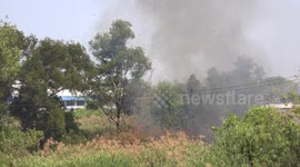 Dry weather in Thailand triggers brush fire