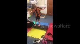 Inspirational moment boy with cerebral palsy walks without splints