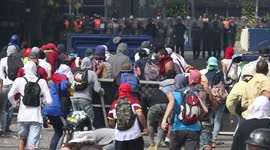 Clashes on the streets of Caracas as Venezuela stages mass protests