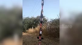 Tower of beer bottles crash down on a youth's head as tries taking a selfie after stacking them up in southern India