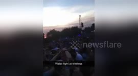 Moment water bottle fight breaks out at UK's Wireless Festival