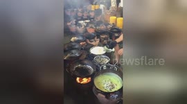 Newsflare Edit - Master chef in Vietnam uses 12 pans to cook 5000 crepes a day at 'Crepe Temple'