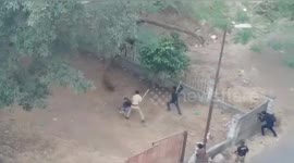 Terrifying moment Leopard attack three people while entering in residential colony , Rescued in India