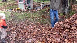 toddler’s first leaf pile