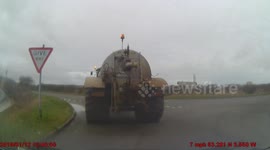 Dash-cam shows moment tractor reverses into car windshield in north Wales