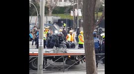 Spanish police clear striking taxi drivers blocking boulevard in Madrid
