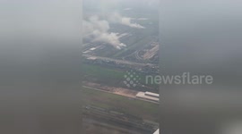 Aerial footage shows Thai farmers burning crops in smog-ravaged Bangkok