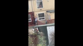 Angry UK neighbours clash in viral 'plank wars' video