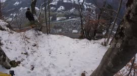Base jumper does dizzying triple somersault into Alpine valley