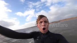 Incredible video shows kite surfer 'flying' for 200m over sand spit