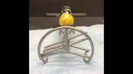 Oddly satisfying ball mechanism sends marbles in different directions