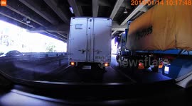 Scary moment Philippines truck driver dubbed Spiderman climbs out of MOVNG vehicle to grab vest