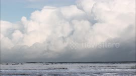 Polar Air Snow Clouds Bublling over Sea - Time Lapse