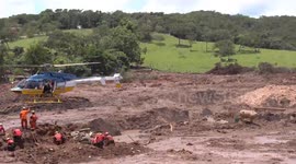 Brazil dam collapse: helicopter lands