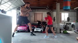 6-year-old girl trains to box with her dad