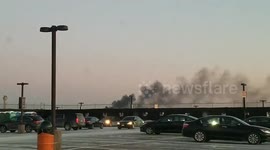 Uber driver films smoke rising from Newark airport fire