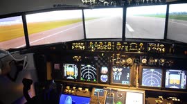 Plane-loving father of two builds flight simulator in dining room