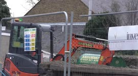 Builders had shock of their lives when they unearthed two black bags of human bones