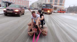 Magic carpet? Russians fined after surfing through streets on rug
