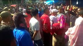 Street vendors protest as police try to remove them for blocking traffic