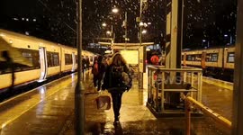 Snow falling at Highbury and Islington Tube station, London