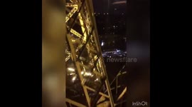 Eiffel Tower elevator at night
