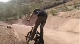 Biker breaks foot