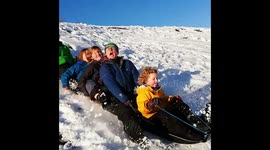 Sledging fun with friends in The Lake District