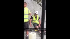 20 years old and playing with building sand! Shirking on the job!