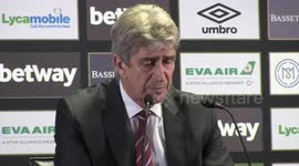Pellegrini strikes out at  Klopp
