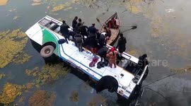 At least six people injured after packed bus falls into drain in northern India