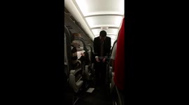 United Airlines Flight Attendant Can't Stop Laughi