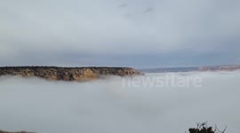 Grand Canyon fills up with fog - rare weather phenomenon