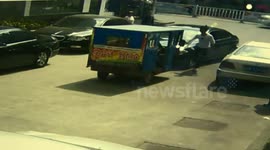 Tricycle  driver fight with  BMW driver  for road conflict