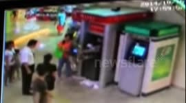 Woman tears ATM apart to recover card in China