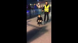 Young girl's wheelchair ice skating in UK